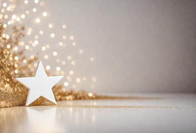 The primary subject of the image is a white star with gold glittering around it. The setting is a white surface, possibly a table or a wall. The visual style is a combination of a photo and digital art, creating a unique and eye-catching design. The colors and mood of the image are predominantly white and gold, giving it a warm and festive atmosphere.